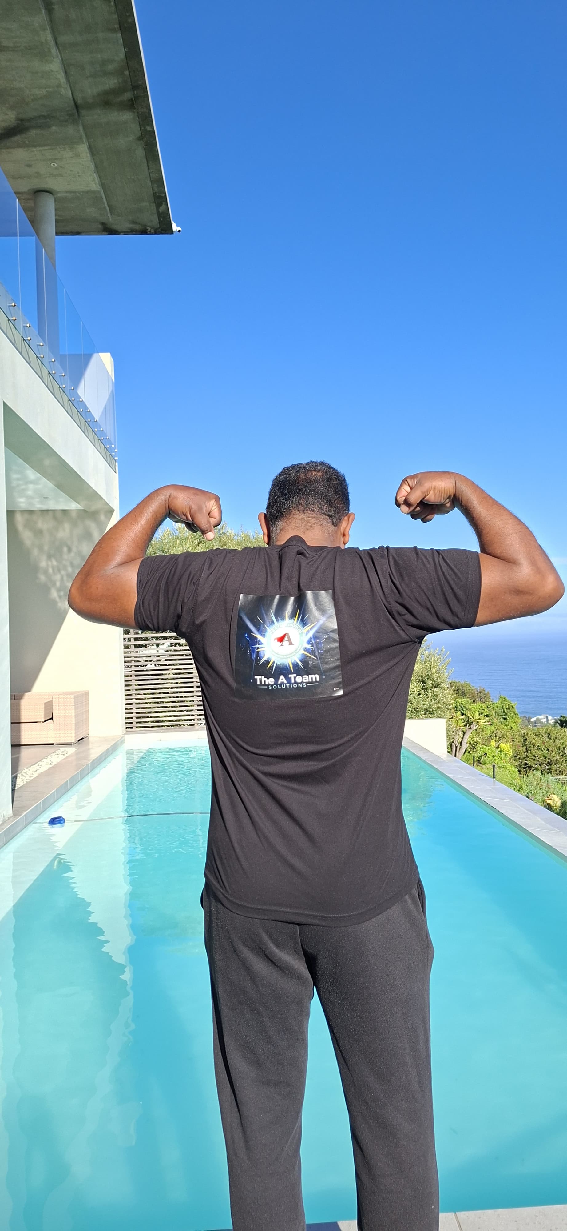 The A Team Solutions team member at a pool in Cape Town